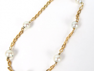 Vente aux enchères Bracelet en or, alternance de perles. Poids tel : 3,2 g