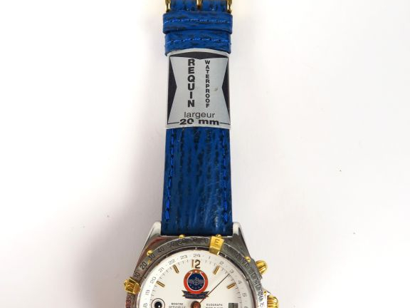 BREITLING. Montre d'homme, boitier acier, bracelet en cuir bleu