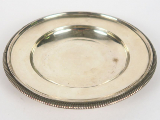 Vente aux enchères BOINTABURET. Vide poche en argent, poinçon Minerve, à décor de godrons