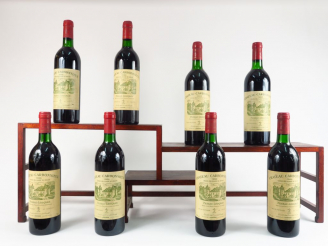 Vente aux enchères 8 BOUTEILLES CHÂTEAU CARBONNIEUX GCC GRAVES - 1986 - 4 BG/4 LB