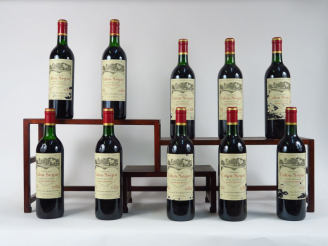 Vente aux enchères 10 BOUTEILLES CHÂTEAU CALON SEGUR GCC ST ESTEPHE - 1990 - CBO - 7 BG/2