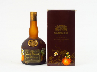 Vente aux enchères 1 BOUTEILLE GRAND MARNIER 'CUVEE SPECIALE/ CENT CINQUENTENAIRE 1827 - 