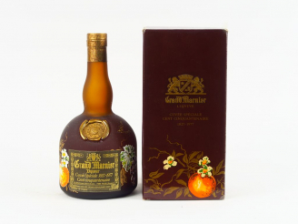 Vente aux enchères 1 BOUTEILLE GRAND MARNIER 'CUVEE SPECIALE/ CENT CINQUENTENAIRE 1827 - 