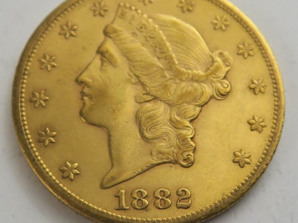 Vente aux enchères 1 pièce de 20 dollars or 1882 CC. Frais acheteur 20 % TTC