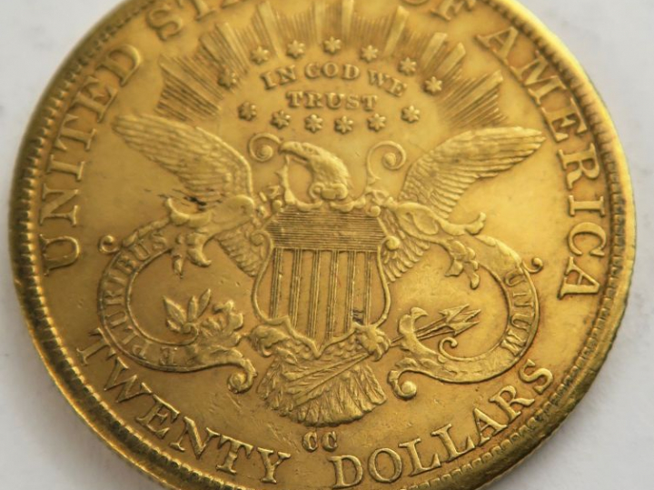 1 pièce de 20 dollars or 1882 CC. Frais acheteur 20 % TTC