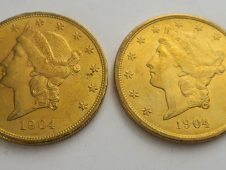 Vente aux enchères 2 pièces de 20 dollars or 1904. Frais acheteur 20 % TTC