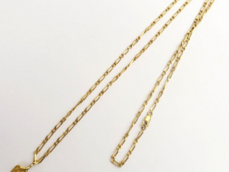 Vente aux enchères Chaine en or, retenant une pépite montée en pendentif. Poids : 18,8 g