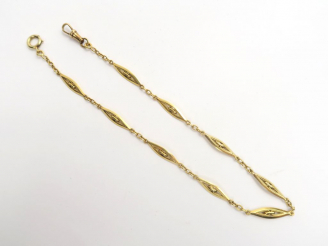 Vente aux enchères Giletière en or. Poids : 14,6 g