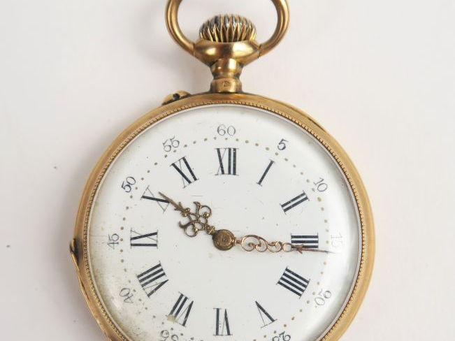 Montre de gousset en or. Poids tel : 60 g