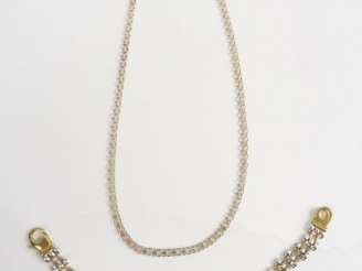 Vente aux enchères Collier et bracelet en argent, maille  articulée. Poids : 25 g