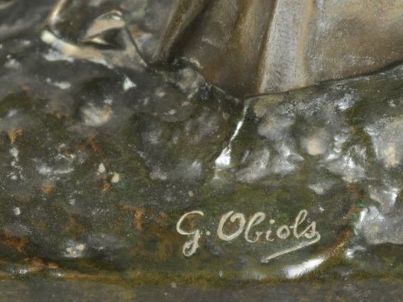 G. OBIOLS "La joueuse de flûte" Sculpture en bronze à patine brune. Si