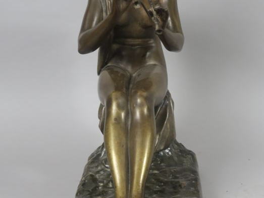 G. OBIOLS "La joueuse de flûte" Sculpture en bronze à patine brune. Si