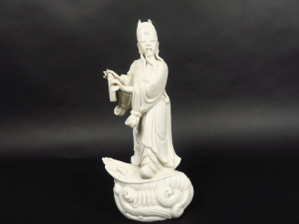 Vente aux enchères Sujet en porcelaine blanc-de-Chine représentant un Immortel taoïste te