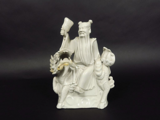 Vente aux enchères Sujet en porcelaine blanc-de-Chine représentant un des huit Immortels 