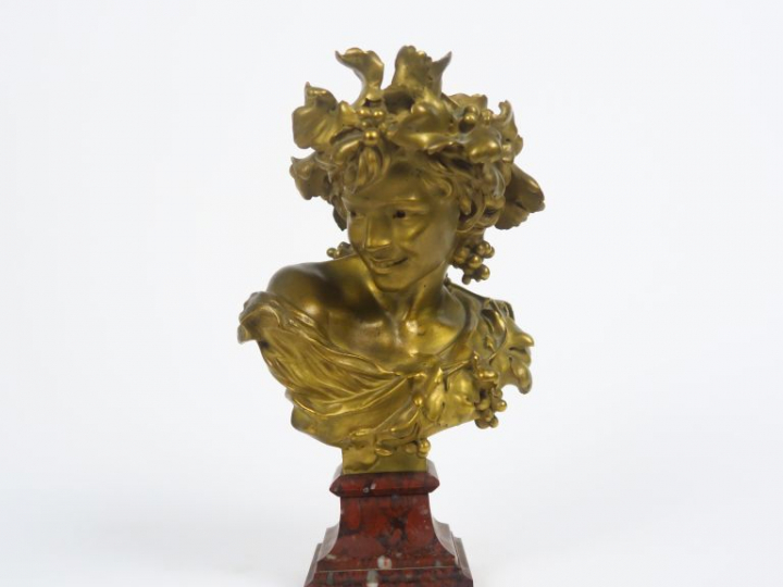 J.B. CARPEAUX  "Bacchus" Sculpture en bronze doré sur un socle en marb