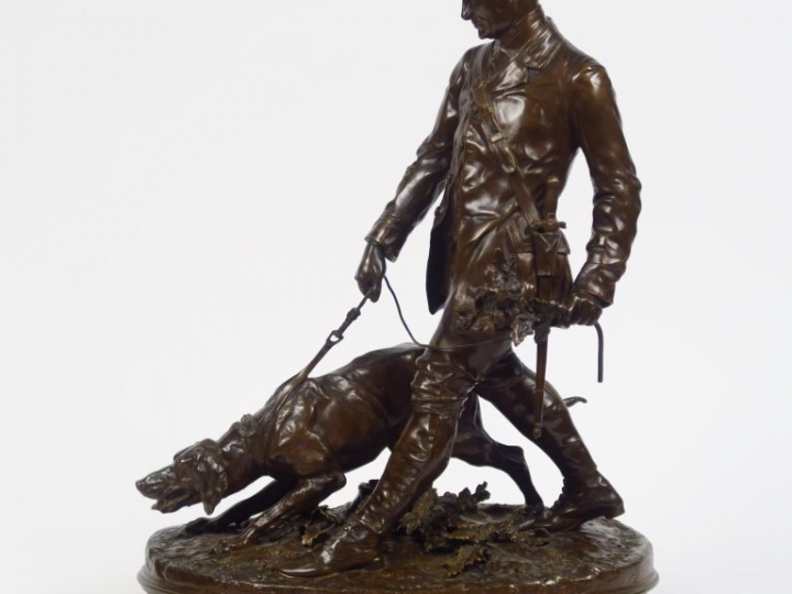 P.J. MENE. "Le valet de limier". Groupe en bronze à patine médaille, s