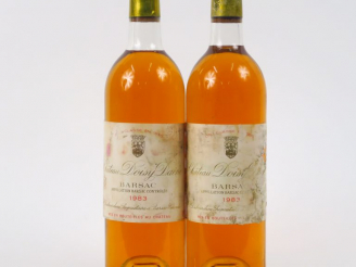 Vente aux enchères 2 BOUTEILLES CHÂTEAU DOISY DAENE CC SAUTERNES - 1983 - 1 BG/1 LB/1 EA