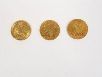 Vente aux enchères Lot comprenant :  - une pièce de 20 Francs or 1911 - deux pièces de 20