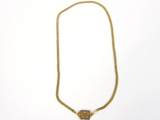 Vente aux enchères Collier articulé en or jaune, fermoir à décor de coeur.  Poids. 8,80 g