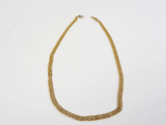 Vente aux enchères Chaine en or jaune.  Poids. 7 g (petit accident)