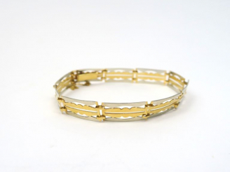 Vente aux enchères Bracelet en or jaune et blanc. Poids. 9,85 g