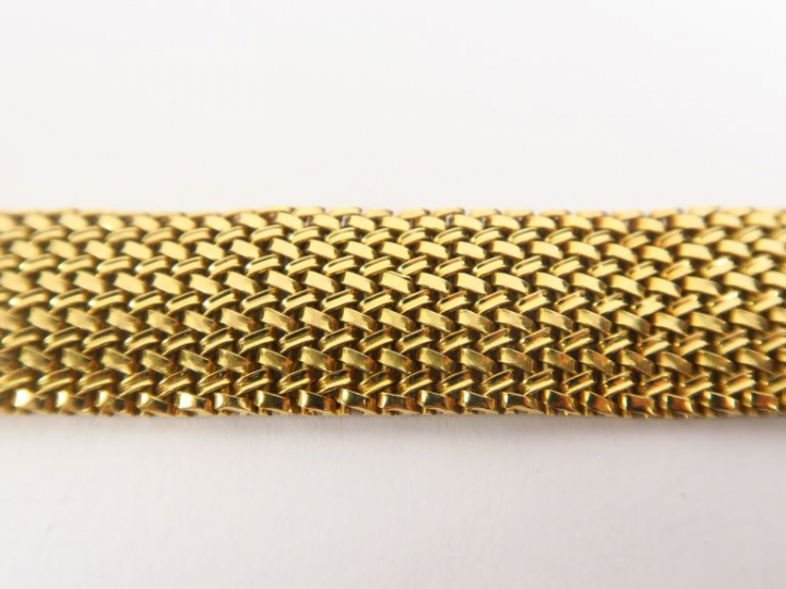 Bracelet souple en or jaune maille tressée. Poids. 48 g