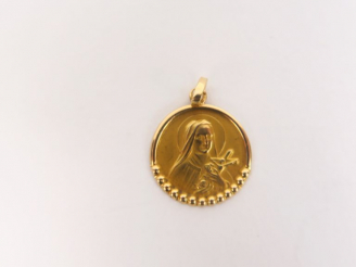 Vente aux enchères Médaille en or jaune. Poids. 1,35 g