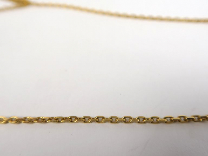Chaine en or jaune, maille forçat.  L. 59 cm  Poids. 9,37 g