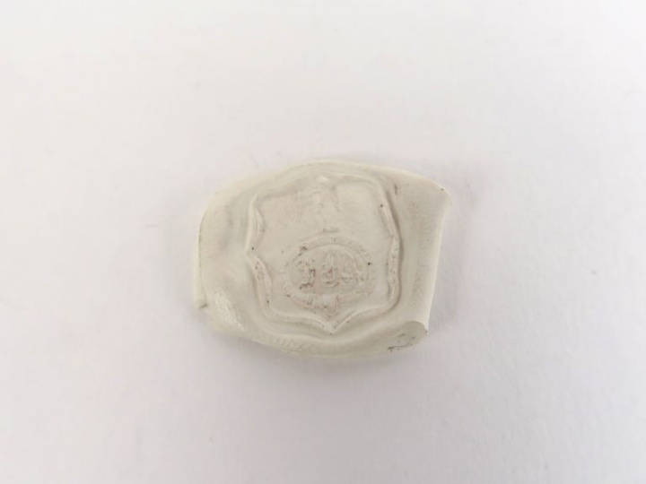 Cachet en pendentif serti d'une intaille.