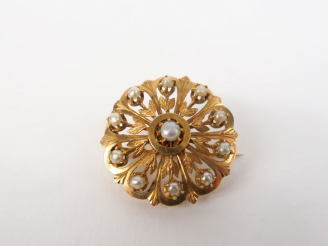 Vente aux enchères Broche Napoléon en or jaune à décor de perles. Poids tel. 4 g