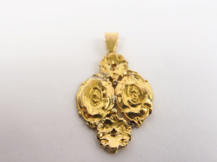 Pendentif en or 14k. Poids. 1,79 g