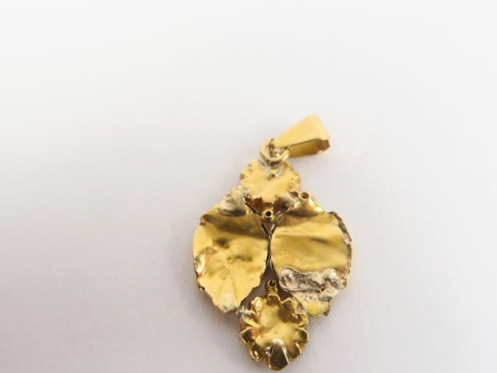 Pendentif en or 14k. Poids. 1,79 g