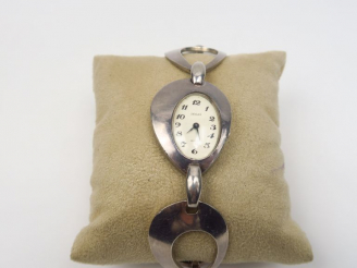 Vente aux enchères ZIEGLER.  Montre de dame en argent.  Poids. 57 g
