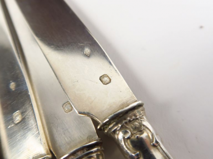 Partie de ménagère en argent, poinçon Minerve, modèle feuillagé. Compr