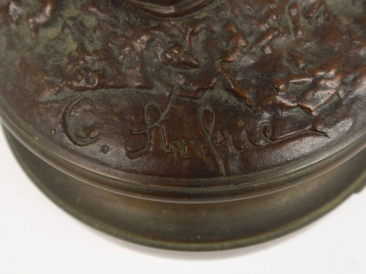 C. ANFRIE  "La première culotte" Sculpture en bronze à patine brune. H