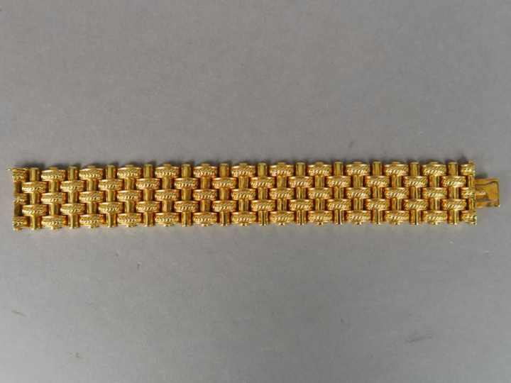 Bracelet tank en or jaune. Long. 18 cm  Poids. 76,28 g
