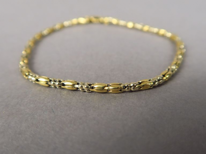 Bracelet articulé en or jaune.  Poids. 4,45 g