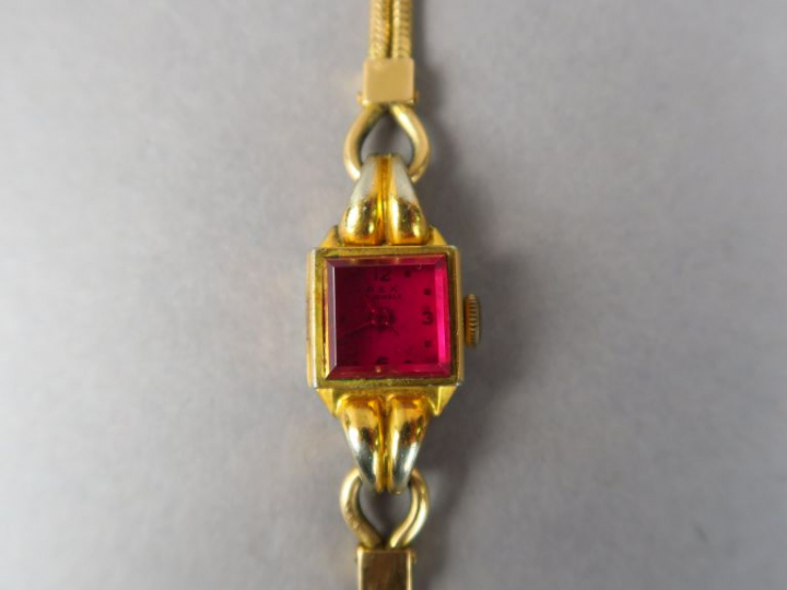 REX.  Montre de dame bracelet en or jaune, boitier en plaqué or, cadra