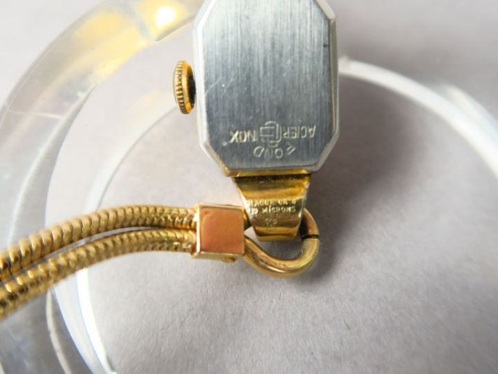 REX.  Montre de dame bracelet en or jaune, boitier en plaqué or, cadra