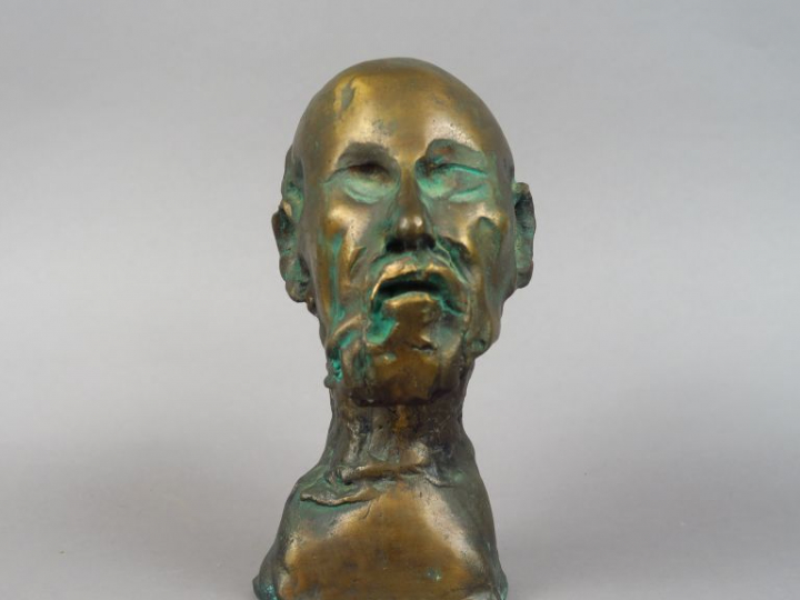 ROULLAND."Portrait d'homme". Sculpture en bronze patiné.  Signée.  Num