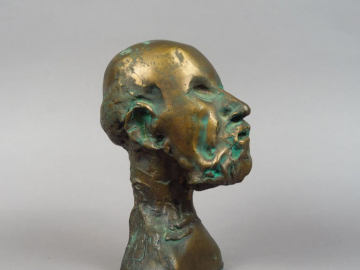 ROULLAND."Portrait d'homme". Sculpture en bronze patiné.  Signée.  Num