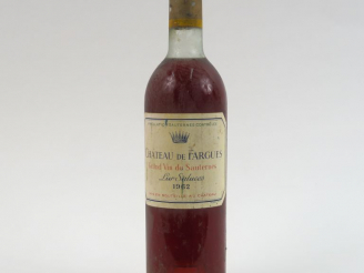 Vente aux enchères 1 BOUTEILLE CHÂTEAU DE FARGUES SAUTERNES - 1962 - BG/CAPS LEGER AB