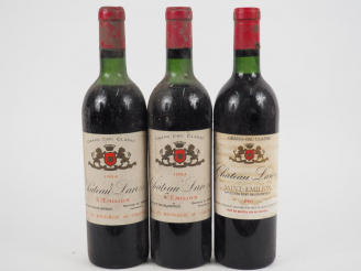 Vente aux enchères 3 BOUTEILLES CHÂTEAU LAROZE GCC ST EMILION - 1964 - 1 BG/2 HEP/BLS