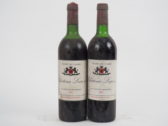 Vente aux enchères 2 BOUTEILLES CHÂTEAU LAROZE GCC ST EMILION - 1973 - MEP/BS