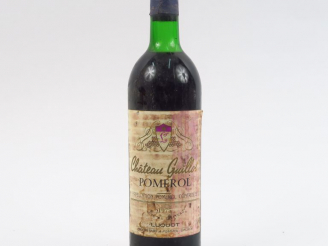 Vente aux enchères 1 BOUTEILLE CHÂTEAU GUILLOU POMEROL - 1975 - HEP/ET