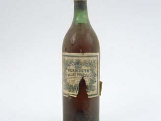 Vente aux enchères 1 VIEILLE BOUTEILLE VERMOUTH NOILLY PRAT - ED/CAPS L AB/BS