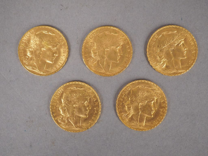 Lot comprenant cinq pièces de 20 Francs or, 1912.