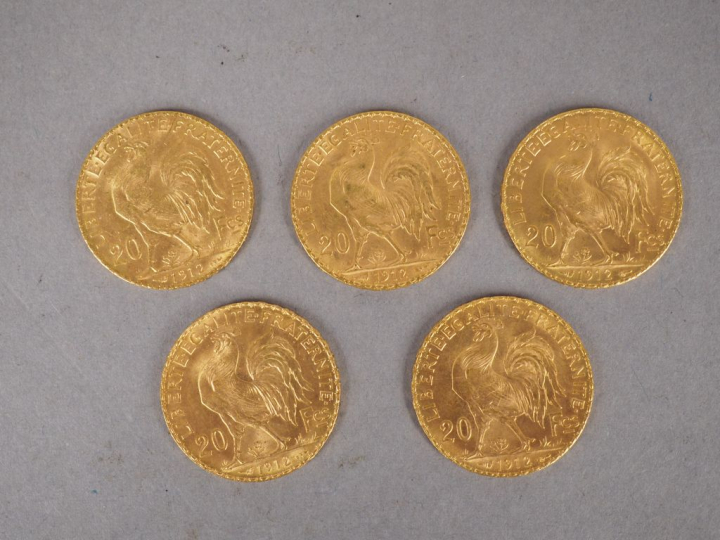 Lot comprenant cinq pièces de 20 Francs or, 1912.