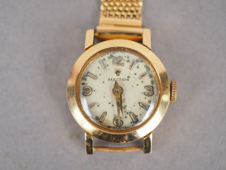 ELECTION.  Montre de dame, boitier et bracelet en or jaune.  Poids tel
