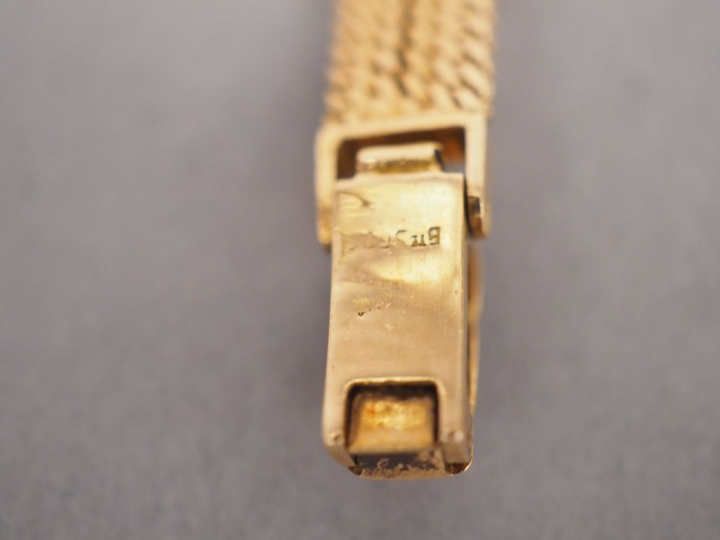 Montre de dame, boitier et bracelet or.  Poids tel. 18,11 g